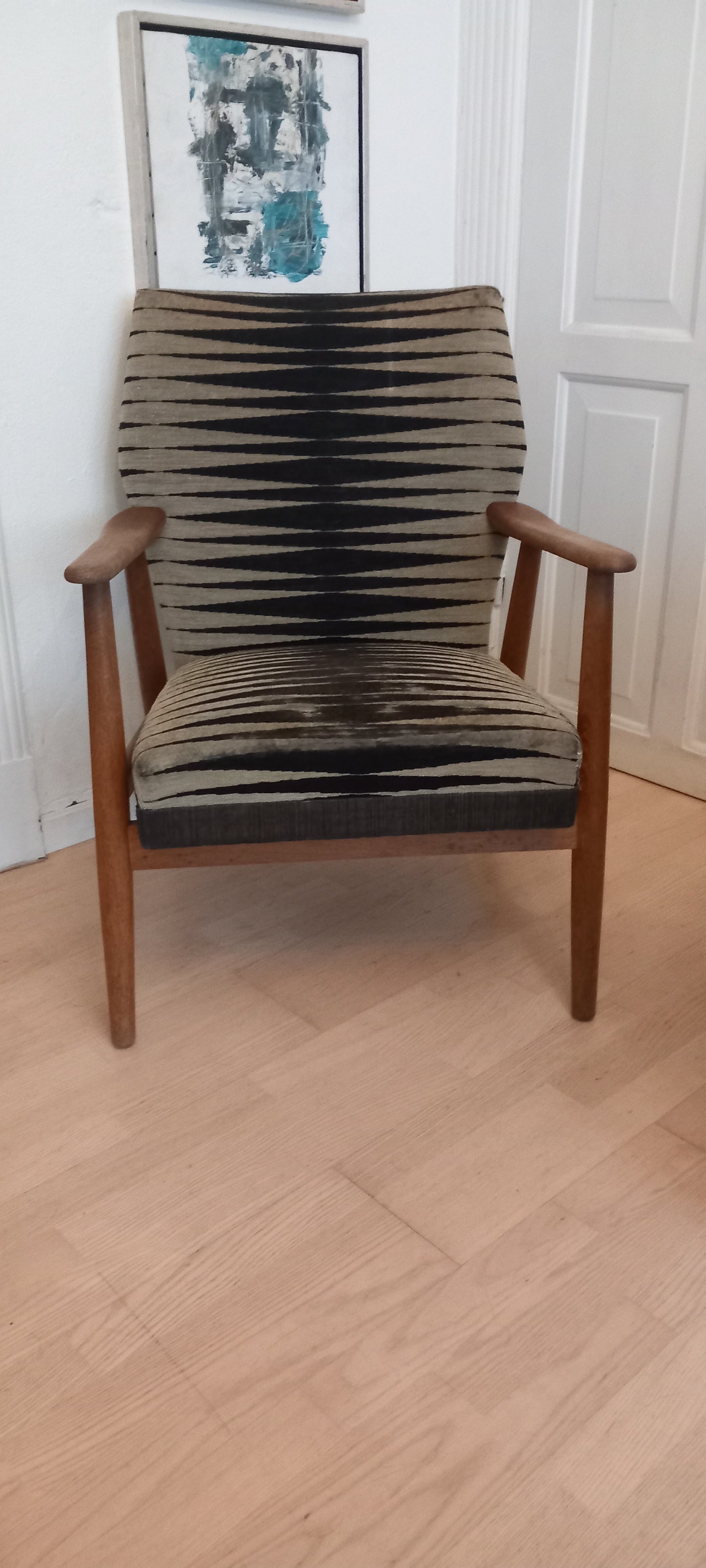 Ombetrækning af gl arkitekt tegnet lænestol