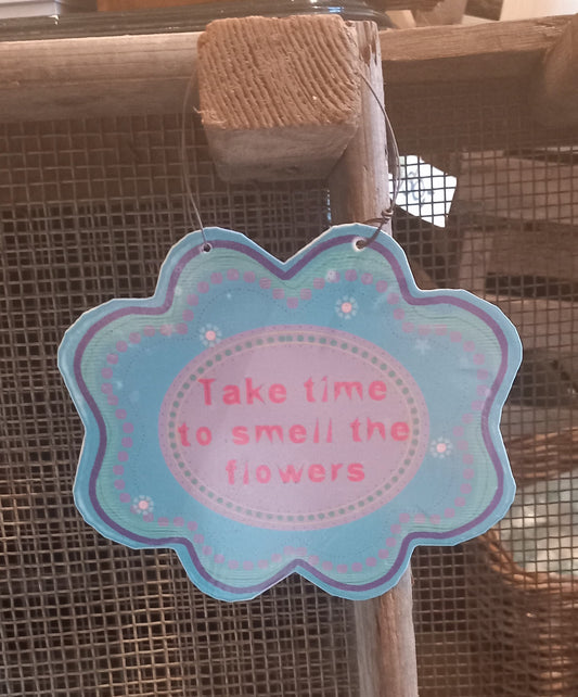 Skilt, metal, Take time to smell the flowers.
