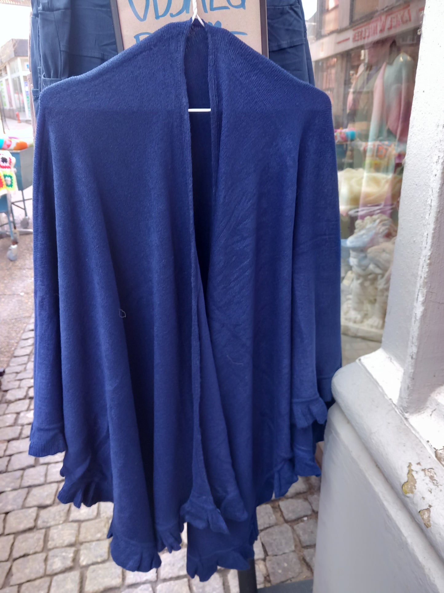 Poncho med broche, flere farver