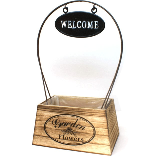 Plantekasse med velkommenskilt