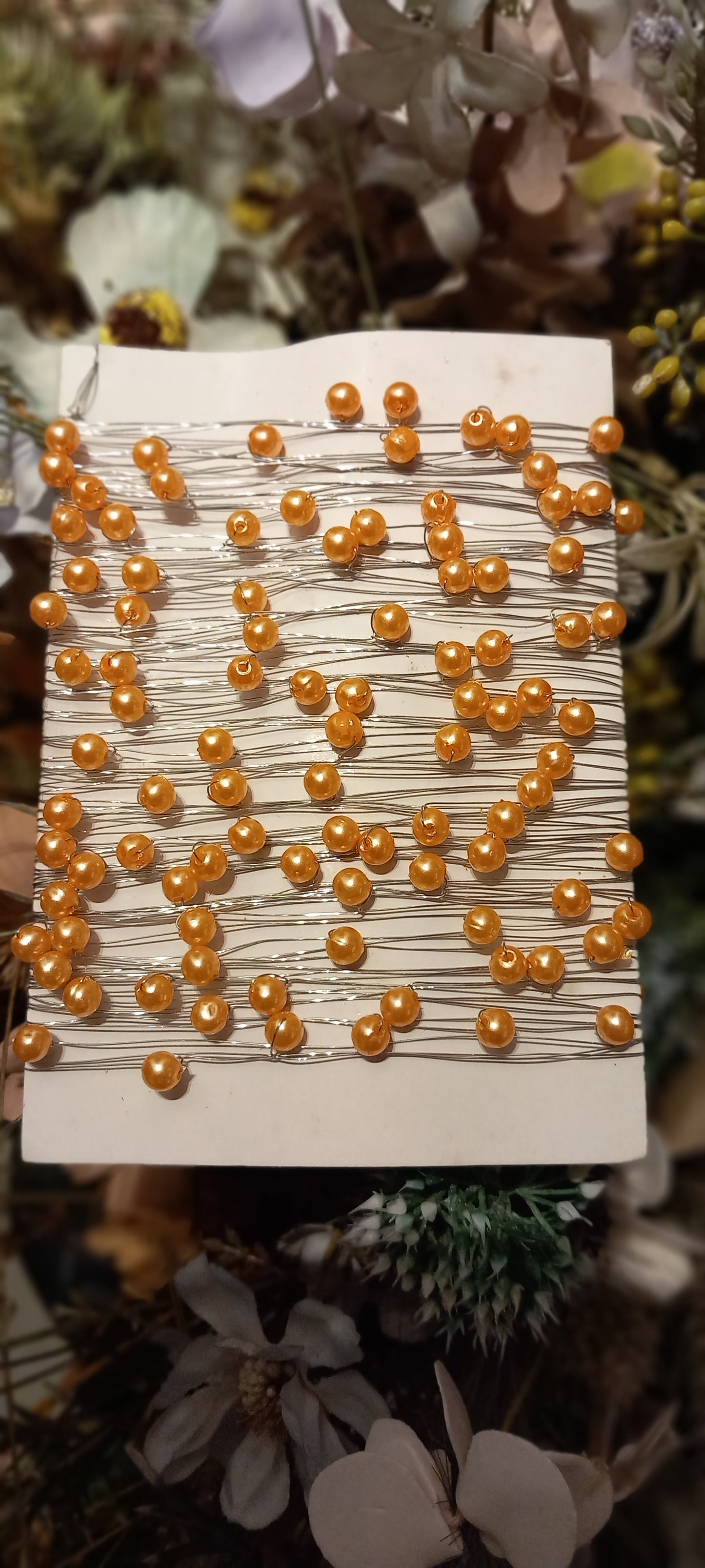Metaltråd med perler, abrikos